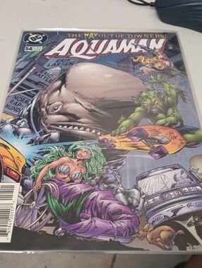 DC Aquaman Comic Cover with Purple and Green Accents In A Sleeve